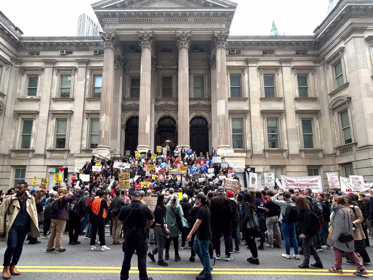 A crowd gathers Thursday, May 29, 2025, at a rally for Dylan, a 20-year-old New York City public school student arrested by immigration officials last week.