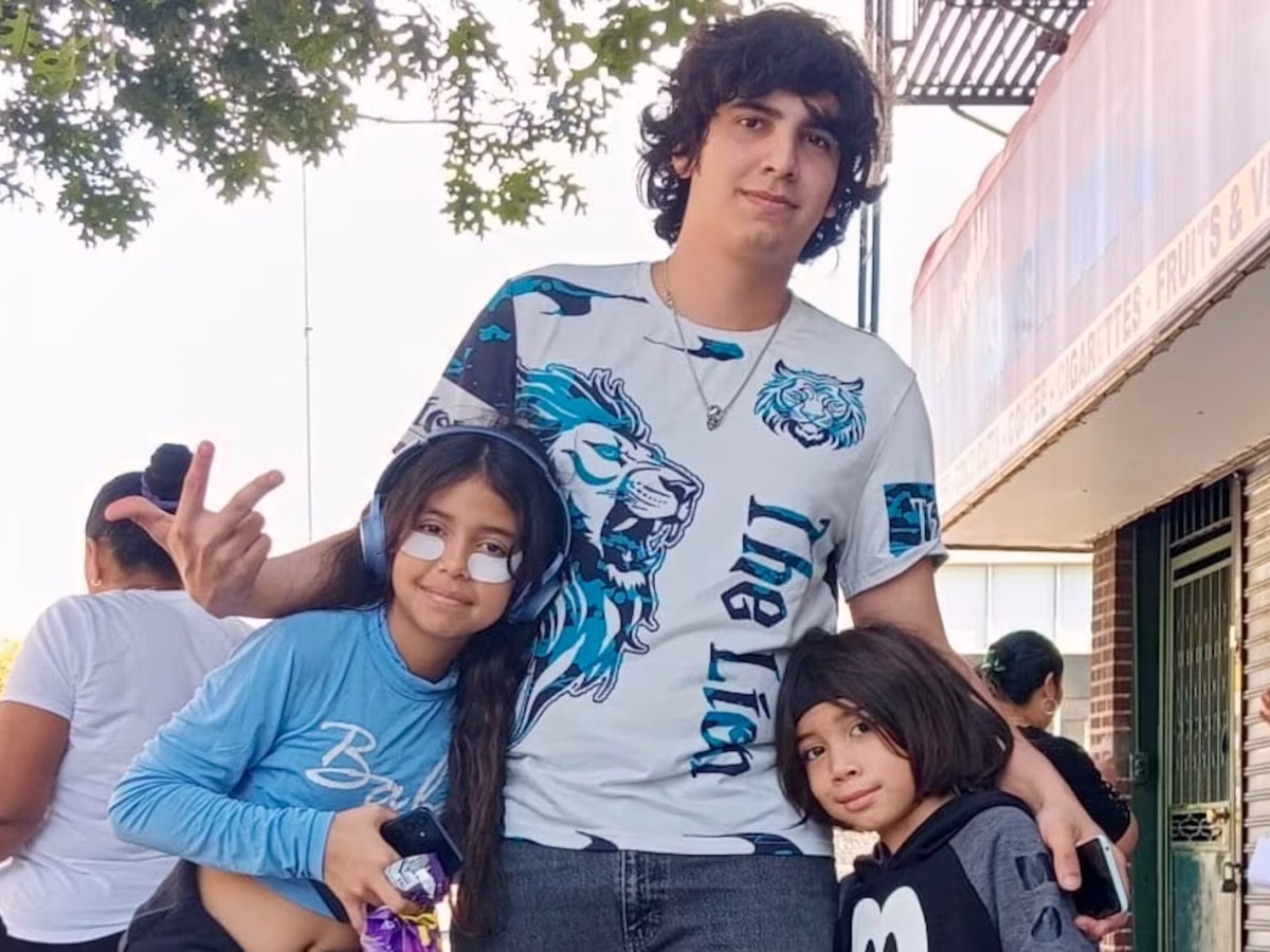 Dylan (center) is flanked by his younger siblings. Dylan was detained by Immigration and Customs Enforcement after showing up for a routine court date on May 21, 2025.