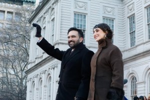 Mayor Zohran Mamdani and his wife, Rama Duwaji, look over the crowd after Mamdani took the oath of office at City Hall,