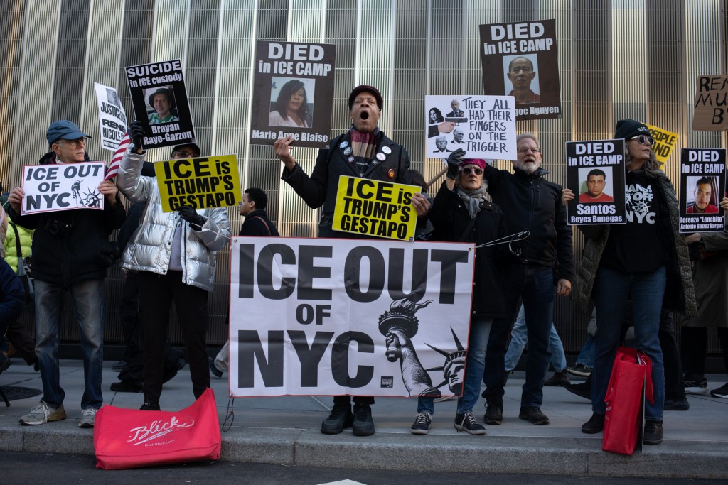 Dozens of immigrant-rights advocates marched to the World Trade Center to protest Department of Homeland Security Secretary Kristi Noem holding a press conference a day after immigration agents fatally shot a woman Minneapolis
