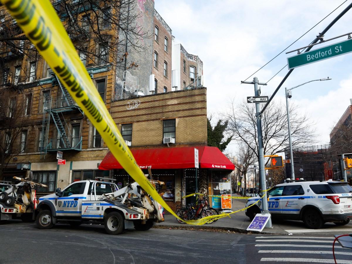 NYPD officers guard a crime scene in Greenwich Village,
