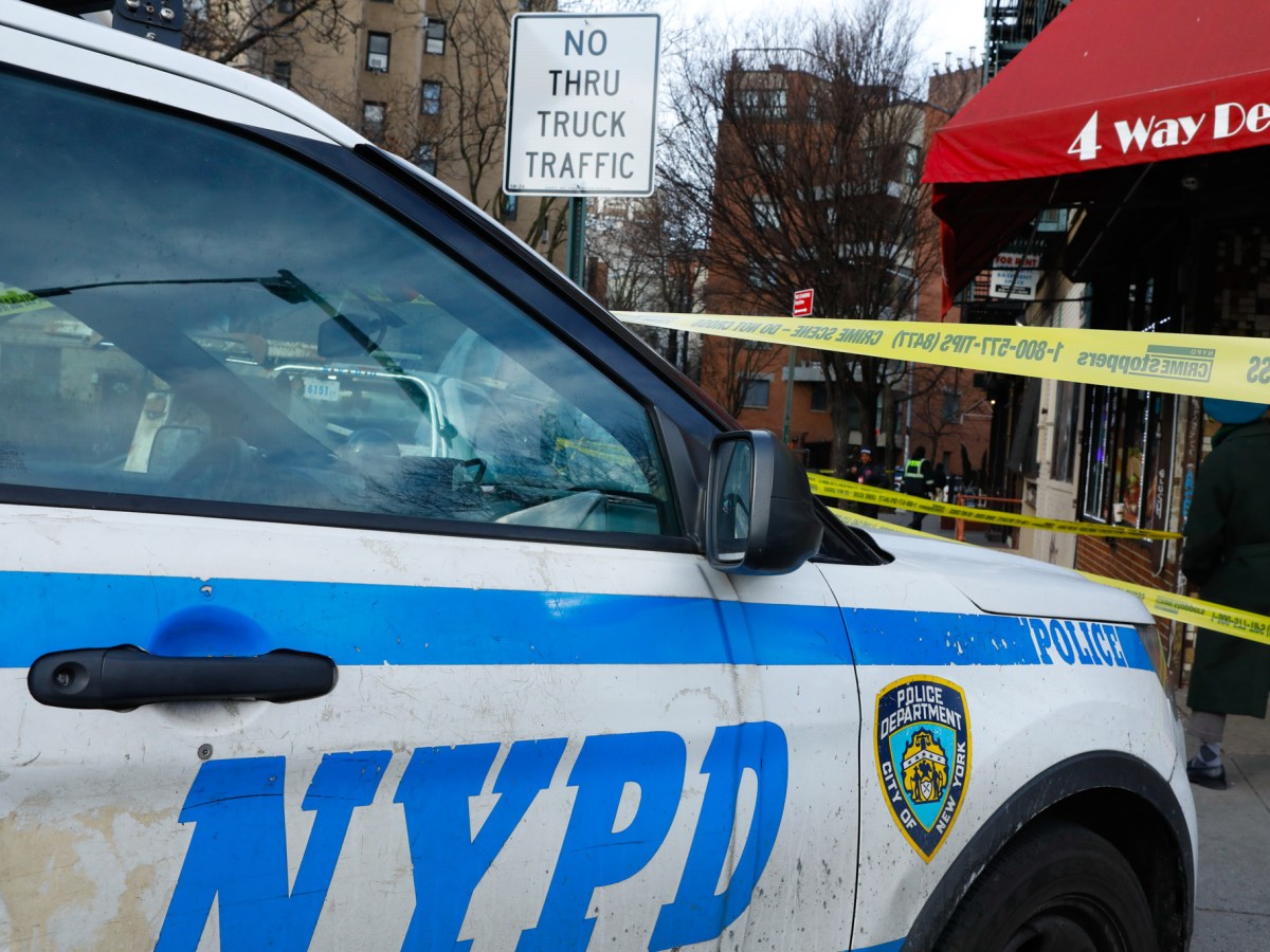 NYPD officers guard a crime scene in Greenwich Village,