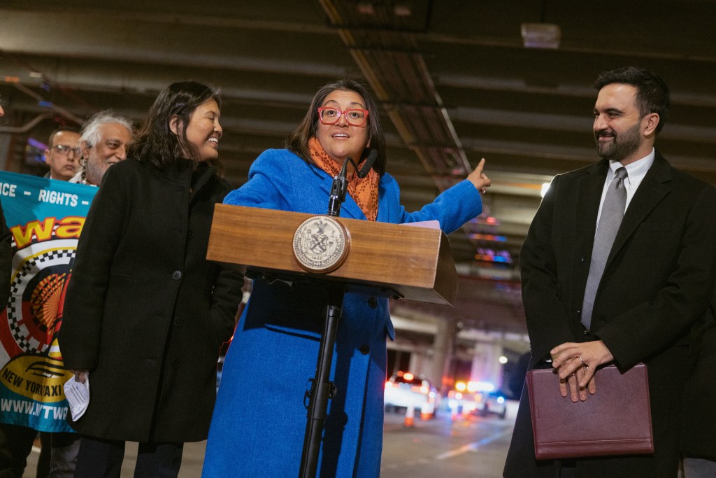 Newly-appointed Taxi and Limousine Commissioner Midori Valdivia speaks alongside Mayor Zohran Mamdani