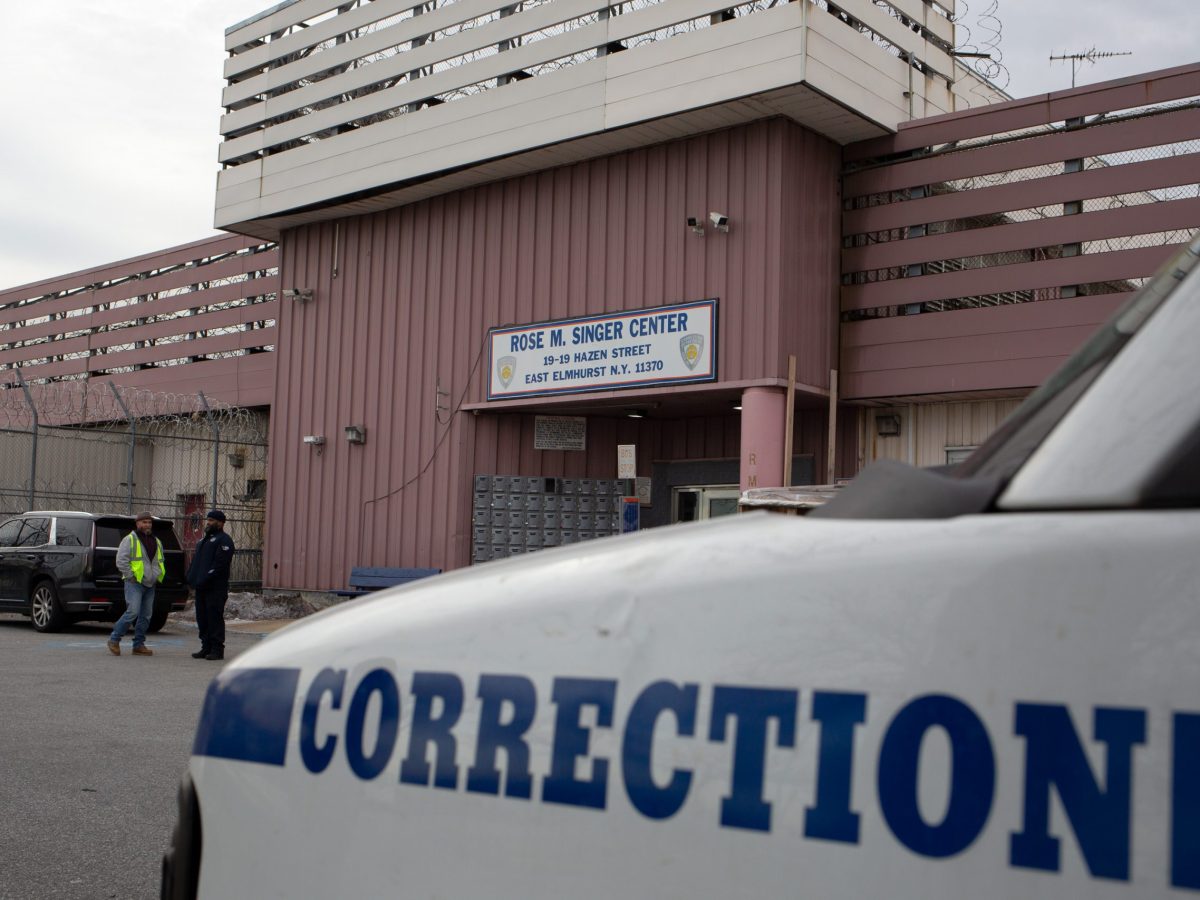 A DOC van sits outside the Rose Singer women's facility on Rikers Island.