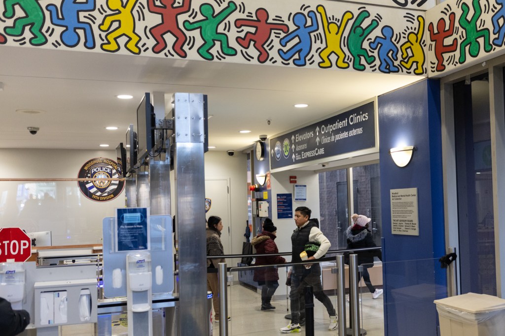 People in and out of Woodhull Hospital in Brooklyn,