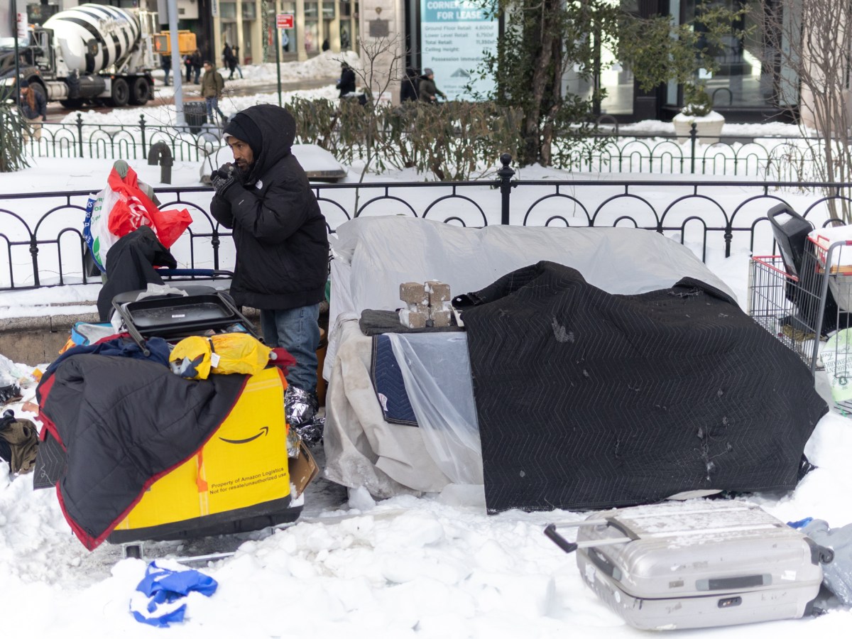 William Galarza set up a makeshift shelter in Union Square to help keep himself and his pet cat warm during the winter,