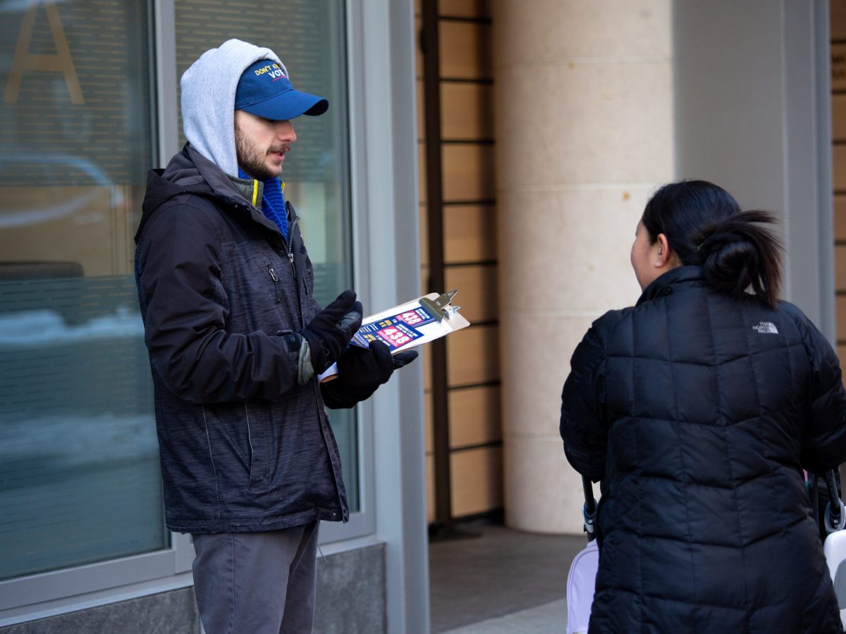 Jewish Voters Action canvaser Ben Johns works on the Upper East Side to register people for the Democratic primary on the Upper East Side.