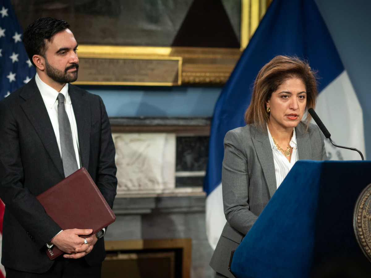 Newly-nominated Commissioner of the Department of Investigation Nadia Shihata speaks alongside Mayor Zohran Mamdani at City Hall