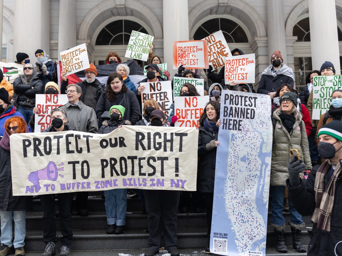 Free speech advocates protest at City Hall against a bill to create a protest buffer zone around schools and houses of worship,