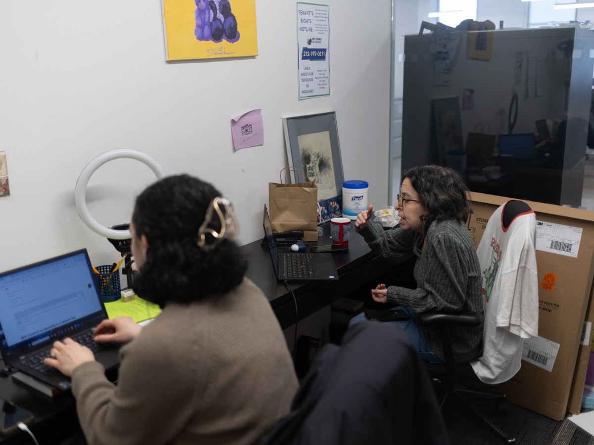 Met Council on Housing Director of Program and Advocacy Andrea Shapiro speaks with tenants on their issues hotline,