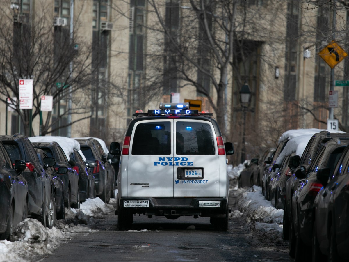 NYPD officers drive toward Manhattan Criminal Court,