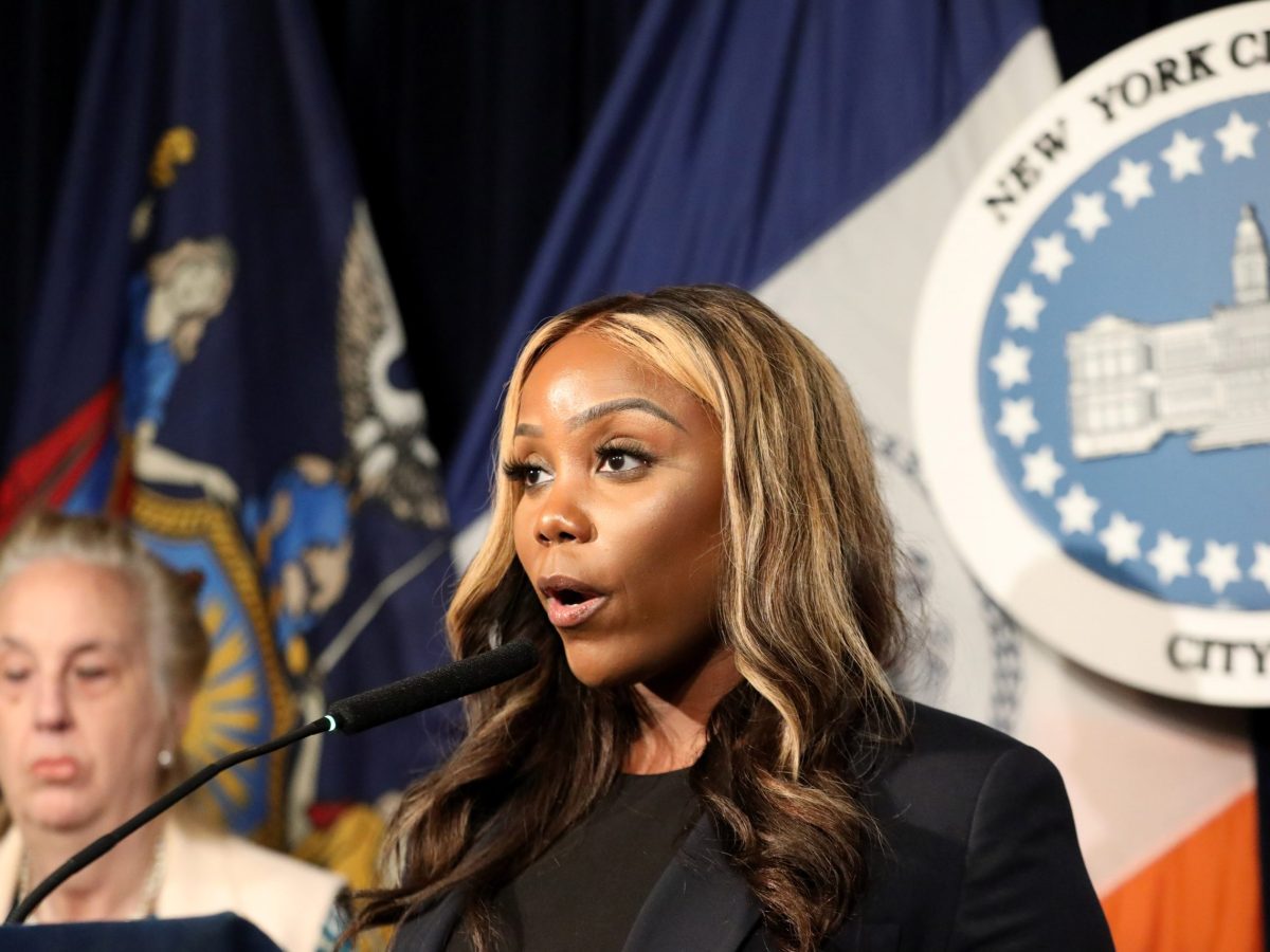Councilmember Farah Louis speaks at a City Hall press conference ahead of a full-Council meeting.
