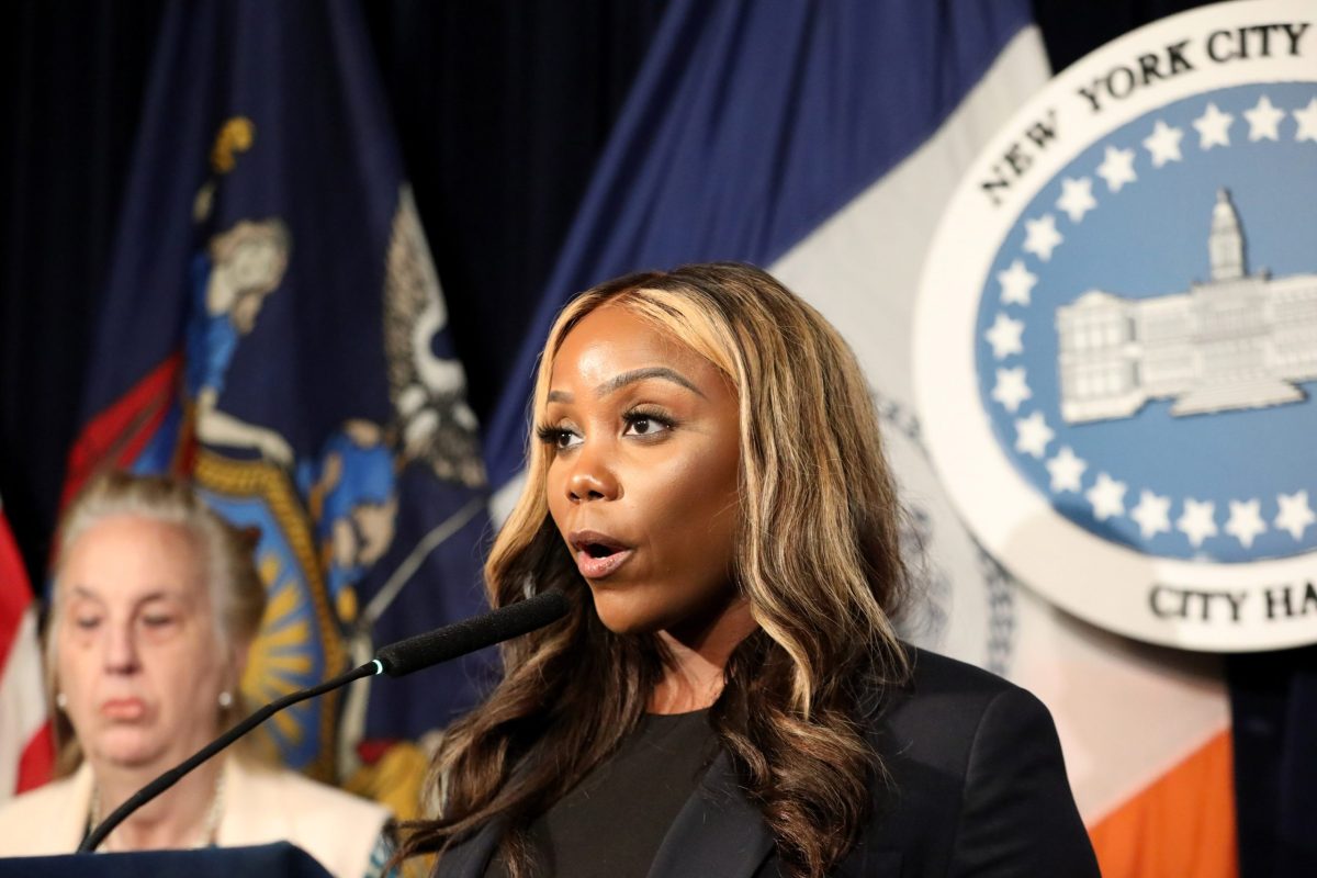 Councilmember Farah Louis speaks at a City Hall press conference ahead of a full-Council meeting.