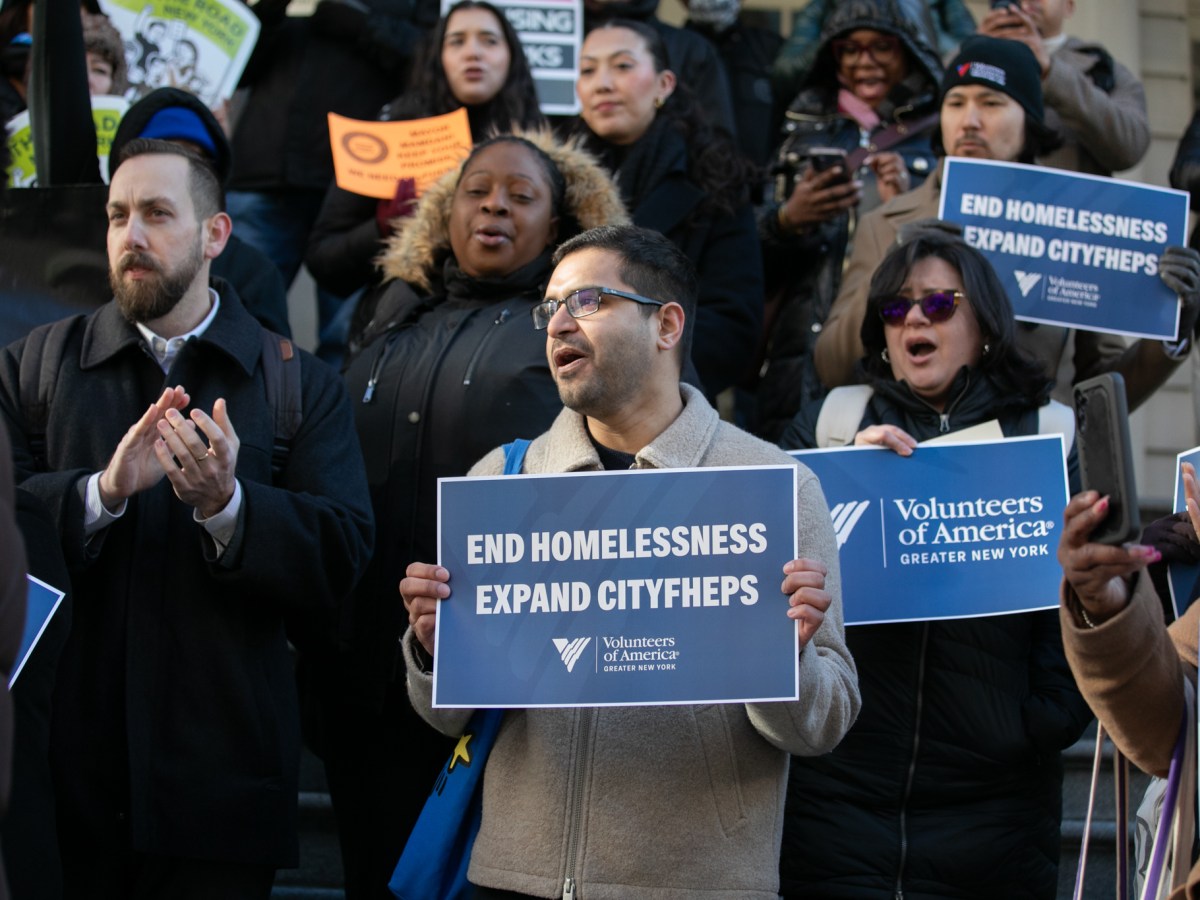 Anti-homelessness advocates rally at City Hall in favor of funding for the CityFHEPS rental voucher program,