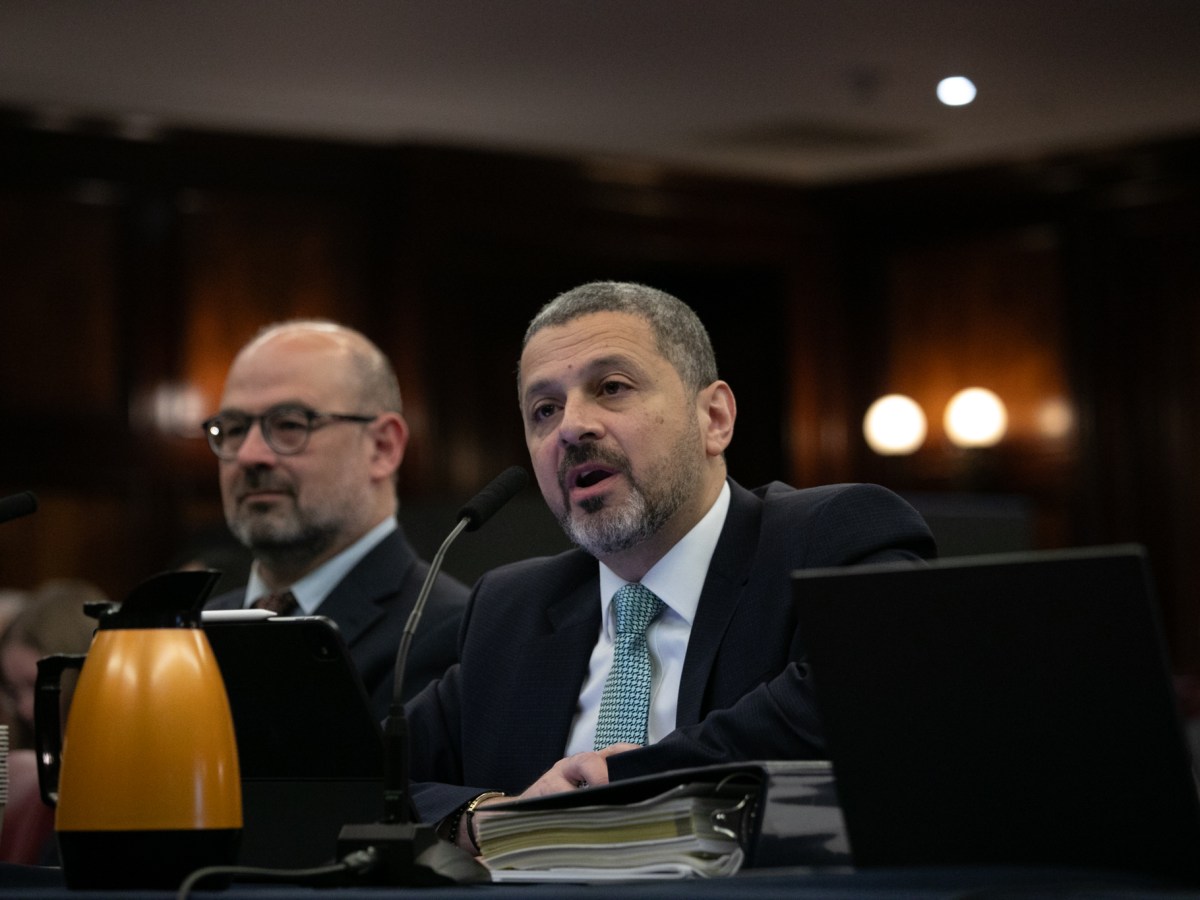 Mayor’s Office of Management and Budget Director Sherif Soliman prepare to testify in City Hall at a Council Budget hearing,
