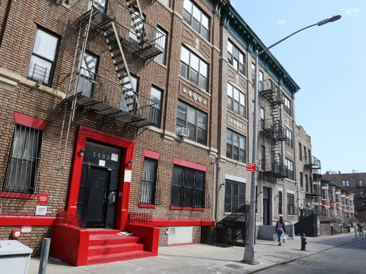 Residential buildings sit on a Crown Heights block.