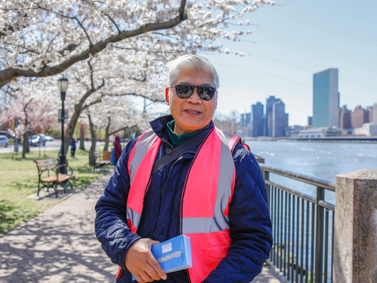 Romeo Cayanan volunteers with the Blossom Defenders on Roosevelt Island,
