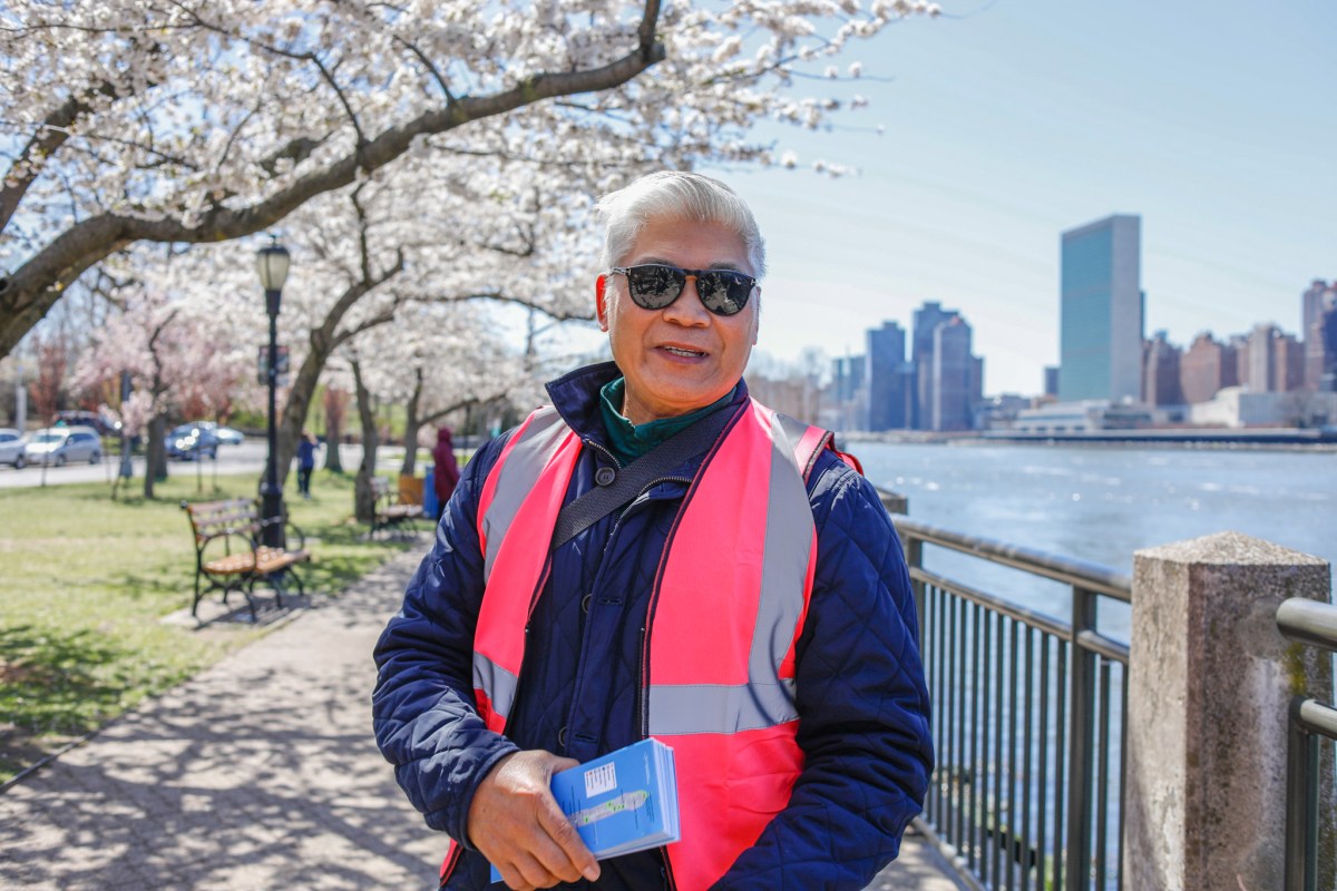 Romeo Cayanan volunteers with the Blossom Defenders on Roosevelt Island,