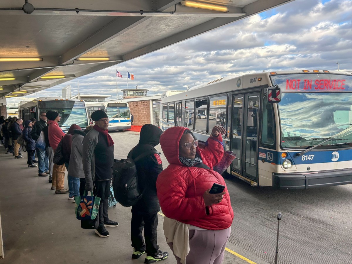 Commuters wait in a long line during the evening rush outside the Staten Island ferry terminal.