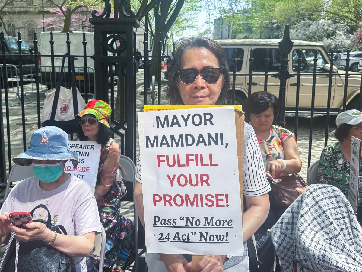 Home care worker Yungfuang Zhang joined rally outside City Hall to mark the start off a hunger strike to end 24-hour shifts