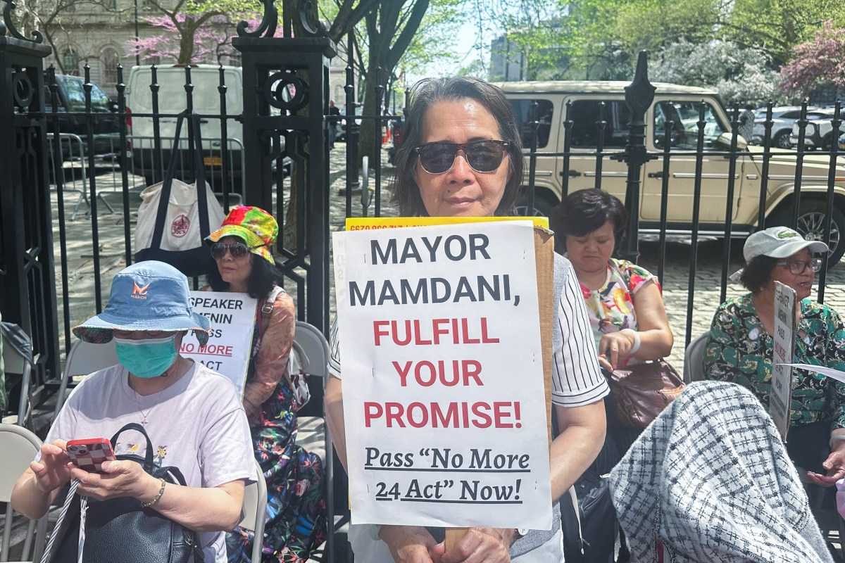Home care worker Yungfuang Zhang joined rally outside City Hall to mark the start off a hunger strike to end 24-hour shifts