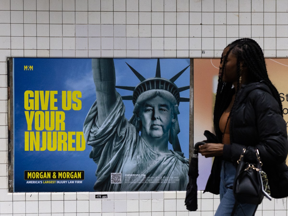 A law firm advertises at the Hoyt-Schermerhorn station in Brooklyn