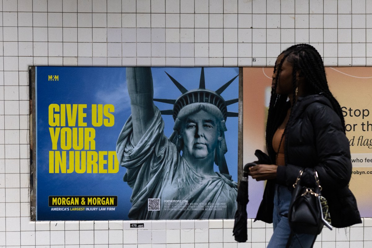 A law firm advertises at the Hoyt-Schermerhorn station in Brooklyn