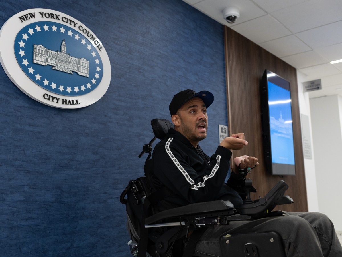 Disability-rights advocate Jose Hernandez speaks outside a Council hearing at 250 Broadway about his concerns with a proposed bill to stop 24-hour home health aide shifts,