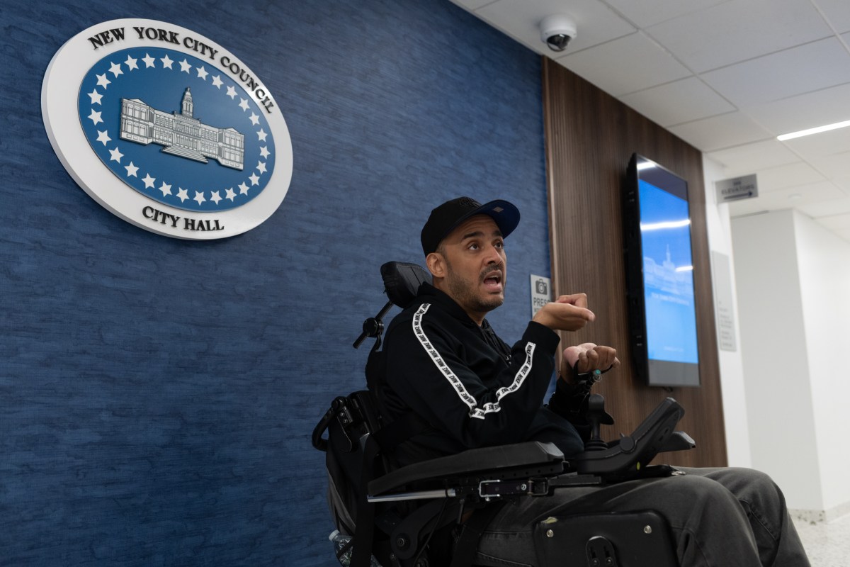 Disability-rights advocate Jose Hernandez speaks outside a Council hearing at 250 Broadway about his concerns with a proposed bill to stop 24-hour home health aide shifts,