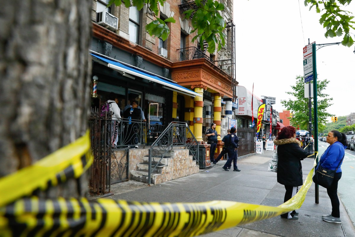 Windows were boarded up at 207 Dyckman Street in Upper Manhattan after a fire killed several people in the building.