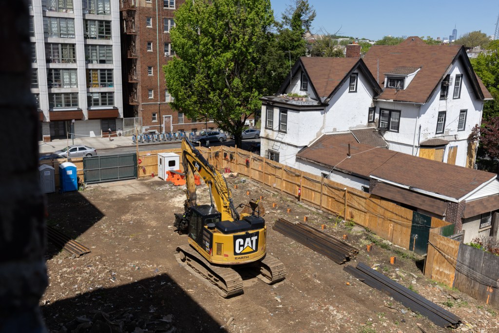 A pile driver sits in a Prospect Lefferts Gardens construction site.