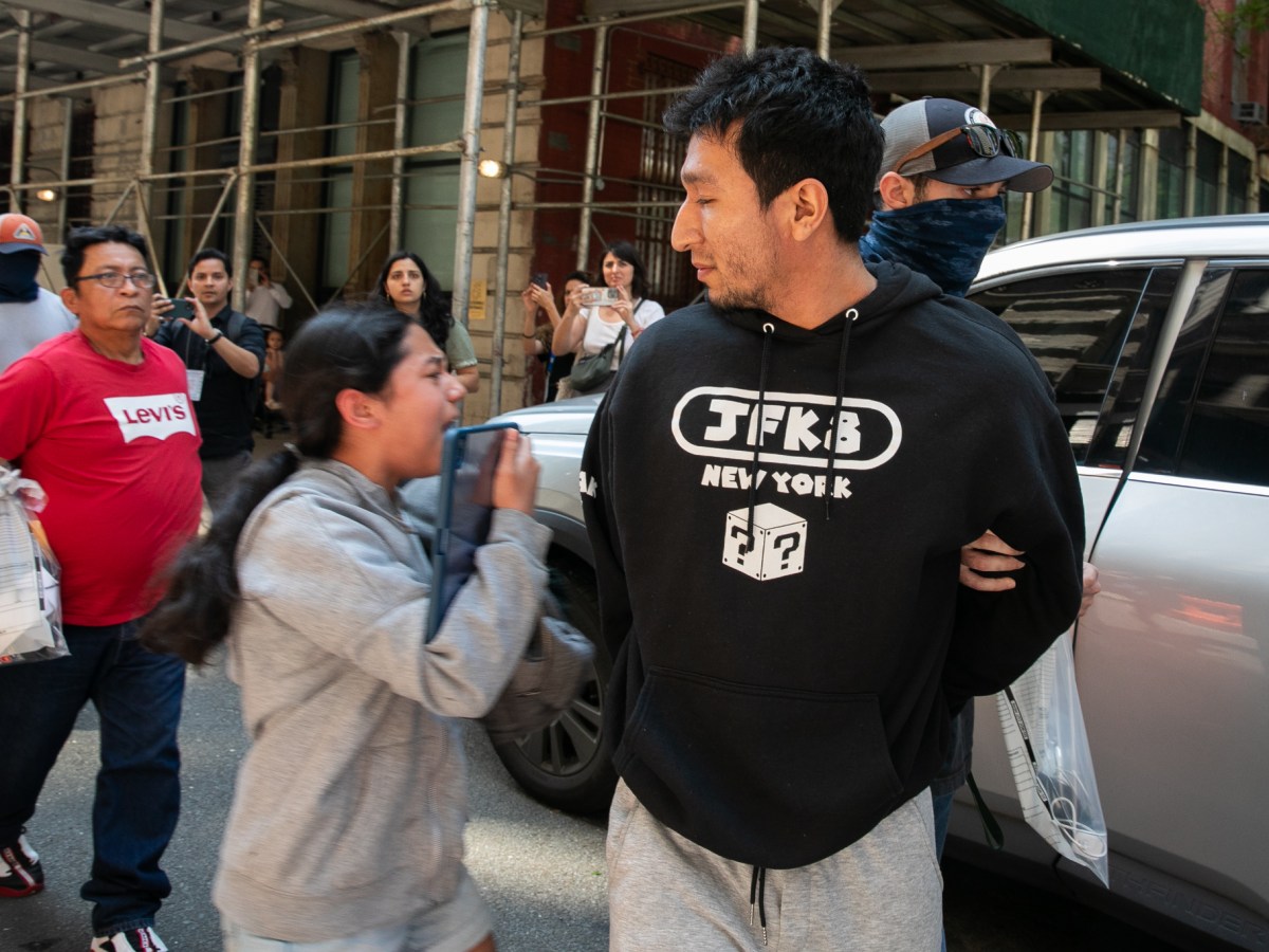 12-year-old Aranza runs to her father while ICE agents detain him following a check-in at their Lower Manhattan office