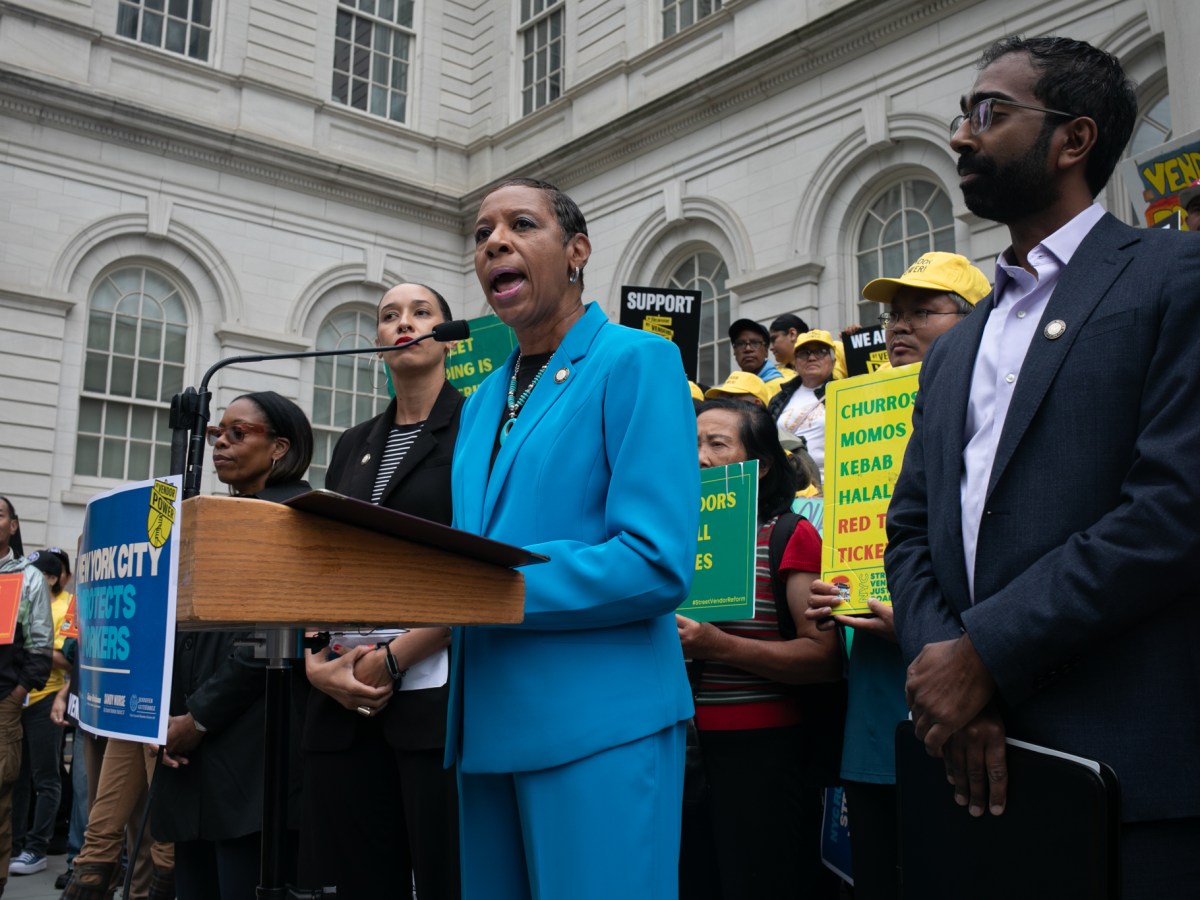 Council Speaker Adrienne Adams speaks at a City Hall rally ahead of a veto override vote on a set of bills regulating delivery apps