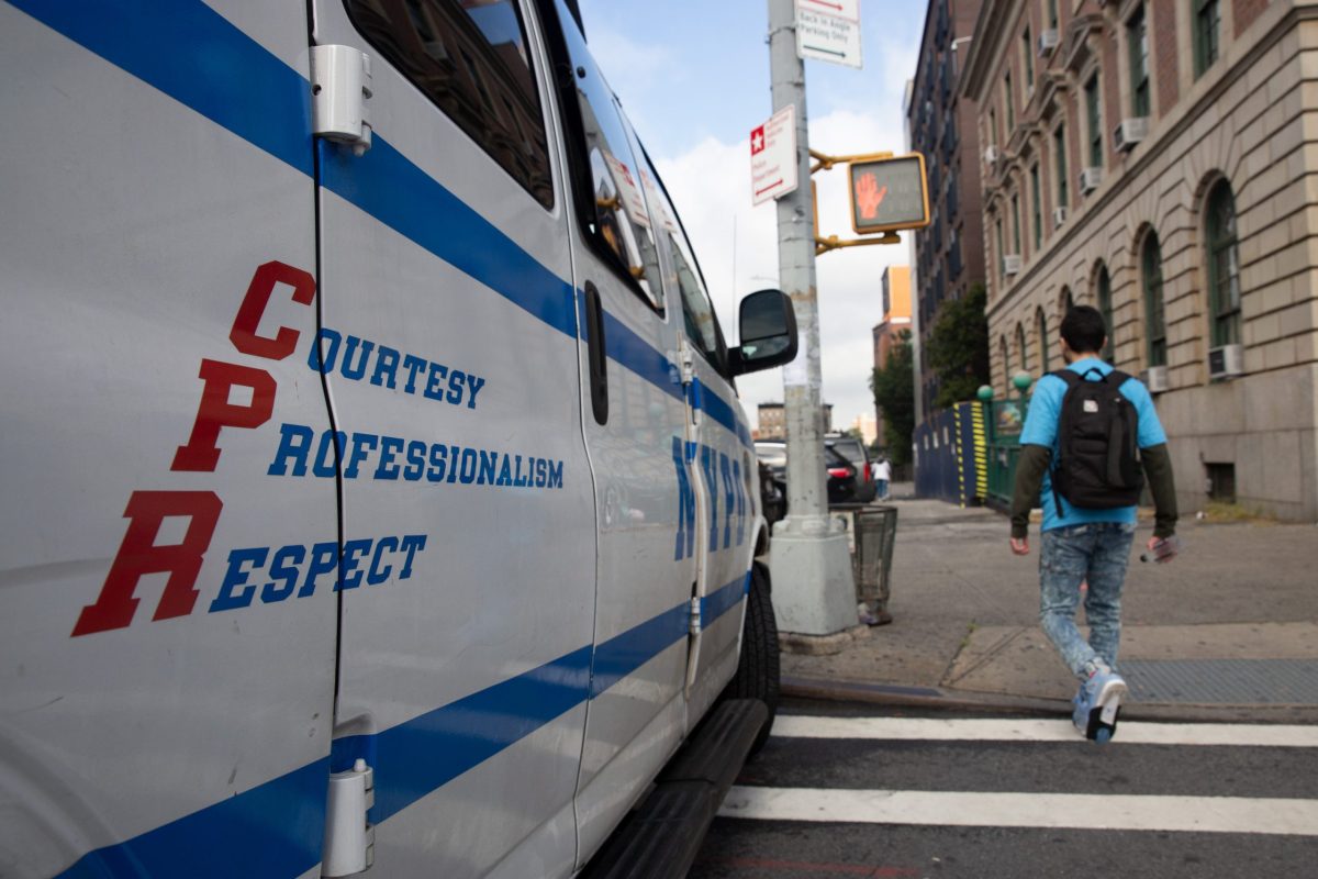 An NYPD vehicle sits in the street outside the 40th Precinct in the South Bronx,