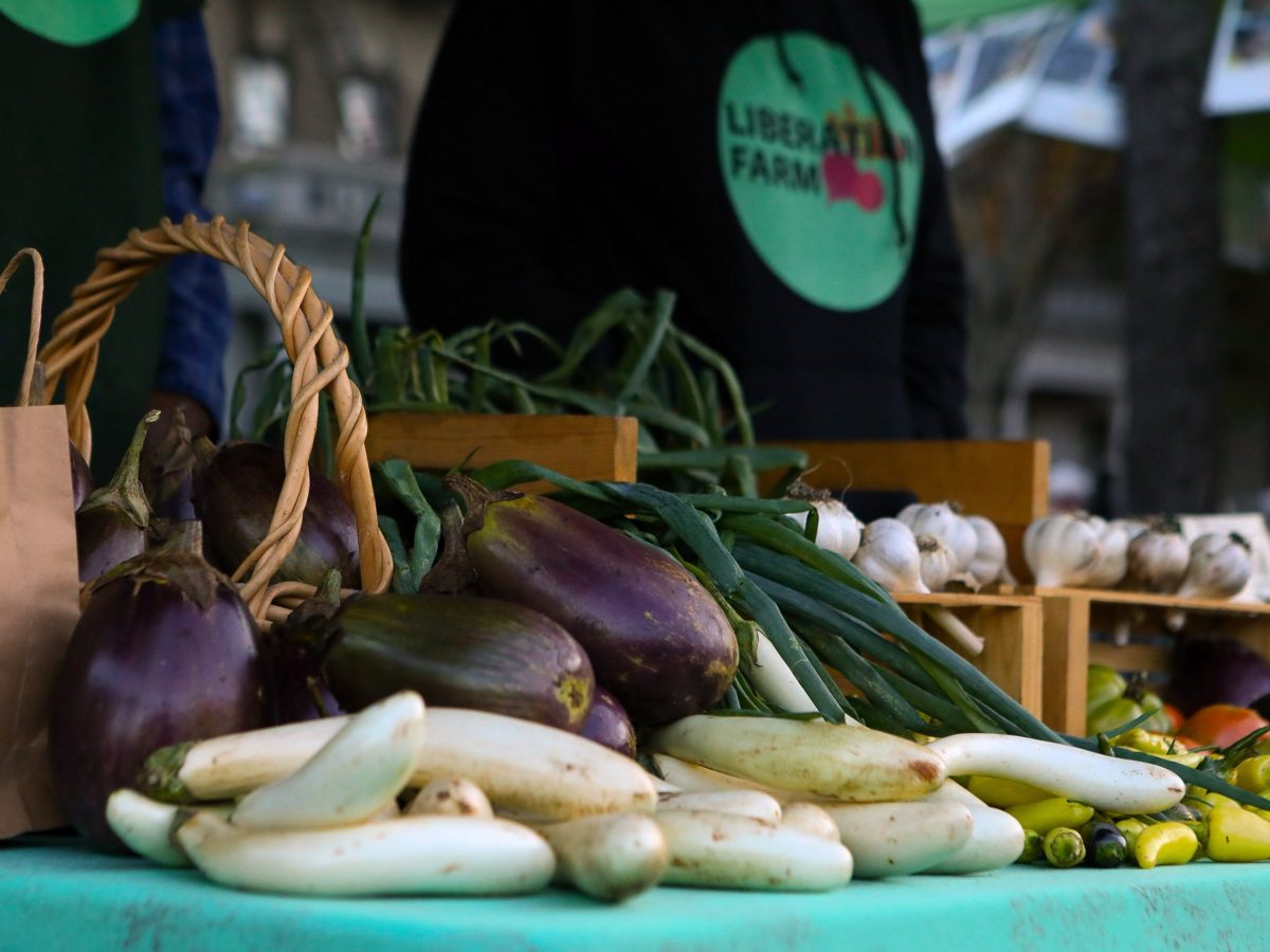 Street vendors sell fresh produce outside the Utica Avenue station in Crown Heights.