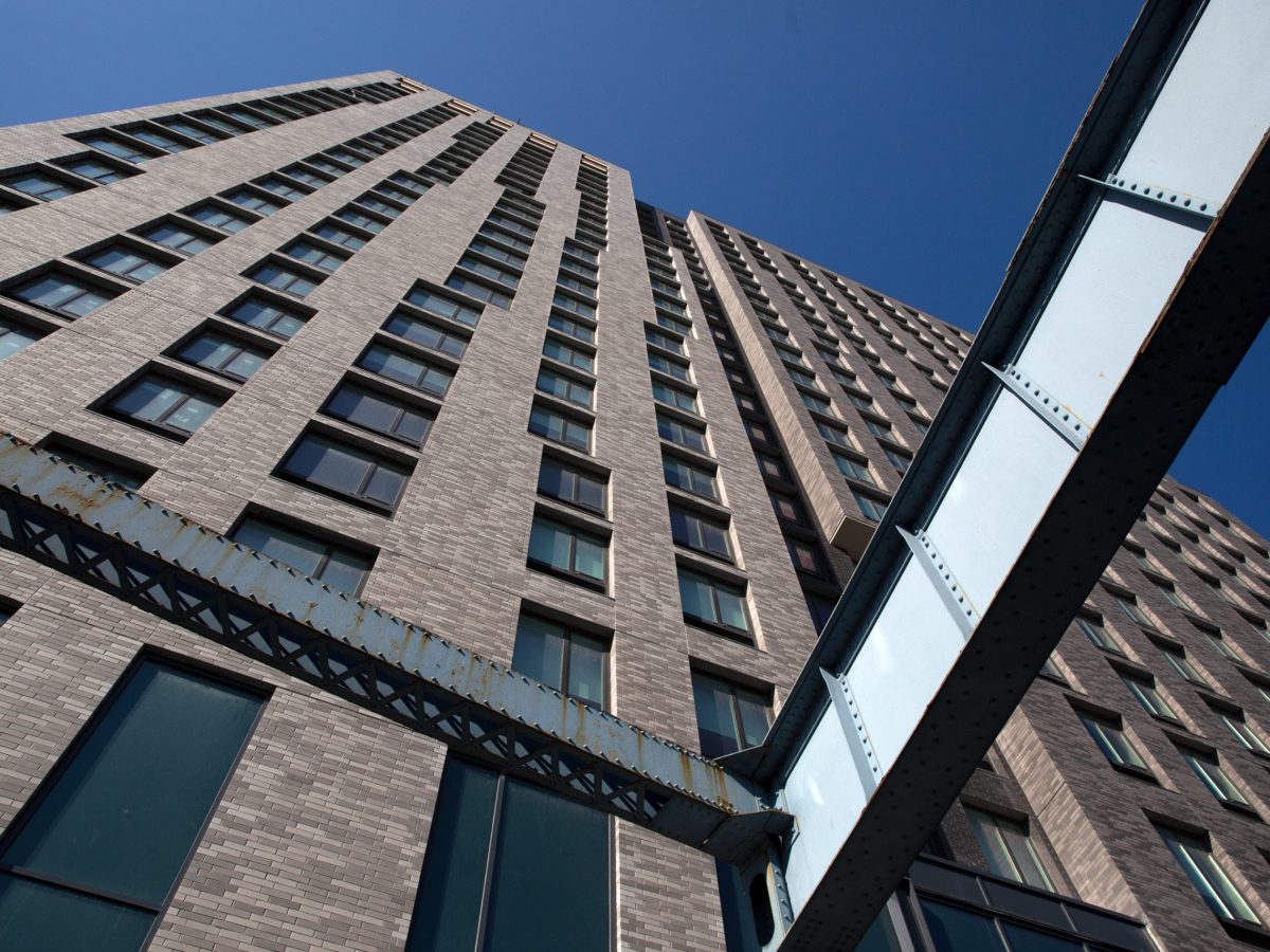The Bronx Point apartments sits on a park nestled between the I87 and The Bronx River.