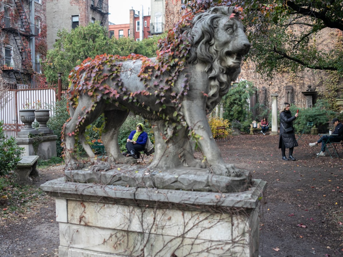 People enjoy a late fall day at the Elizabeth Street Garden