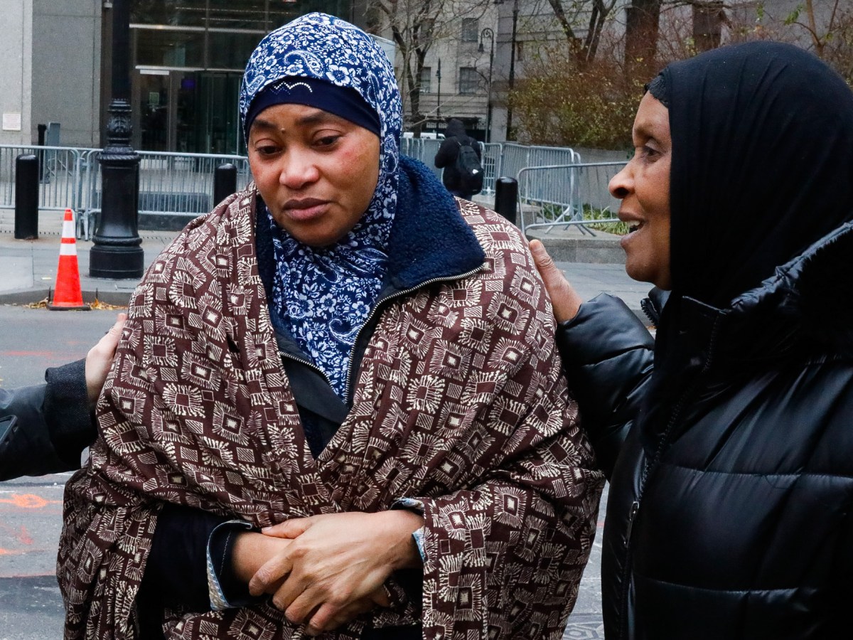 Family members console Aissatou Diallo after she was released from immigration custody at Manhattan Federal Court,