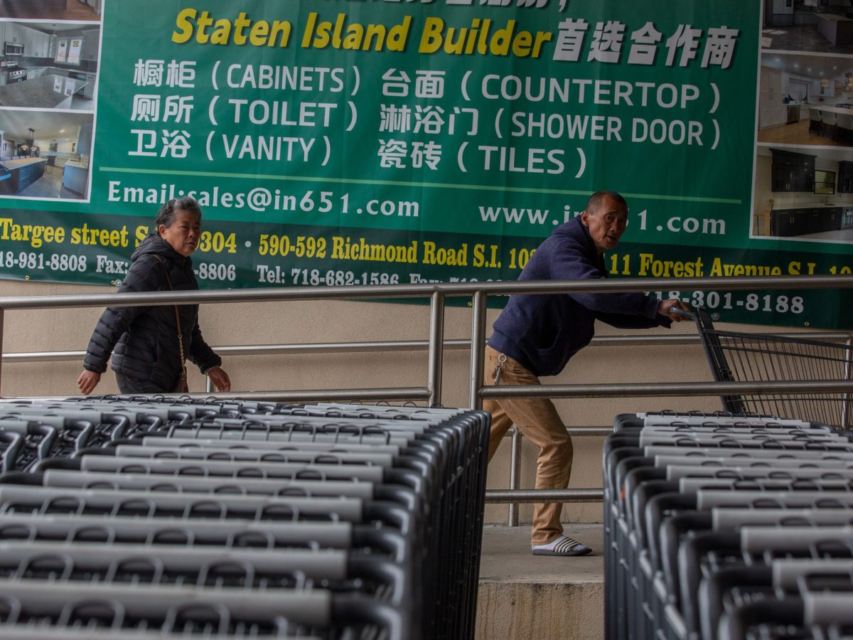 Shoppers enter the HL Supermarket in New Dorp Beach.