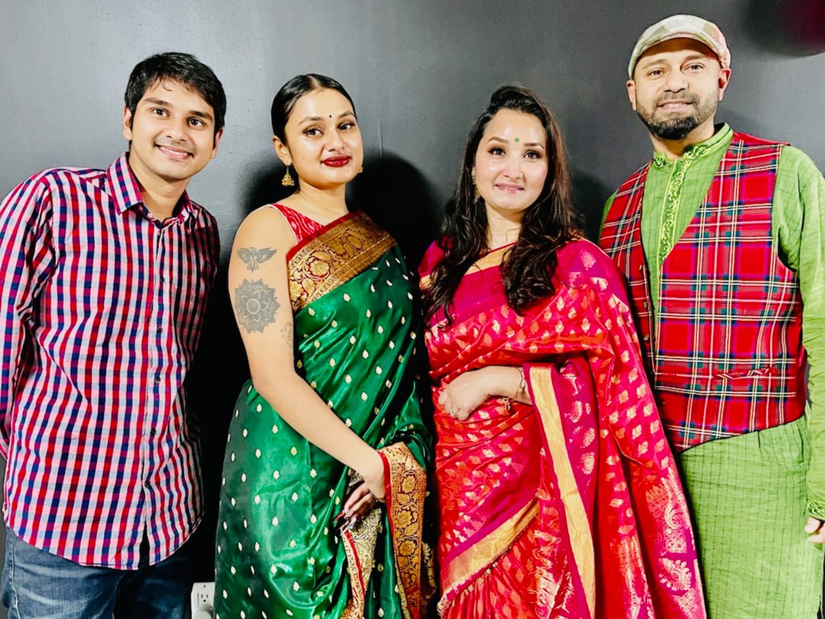 Jabez Chakraborty poses with his sister, Naomi, mother, Juli, and father, Hector, in an undated photo.