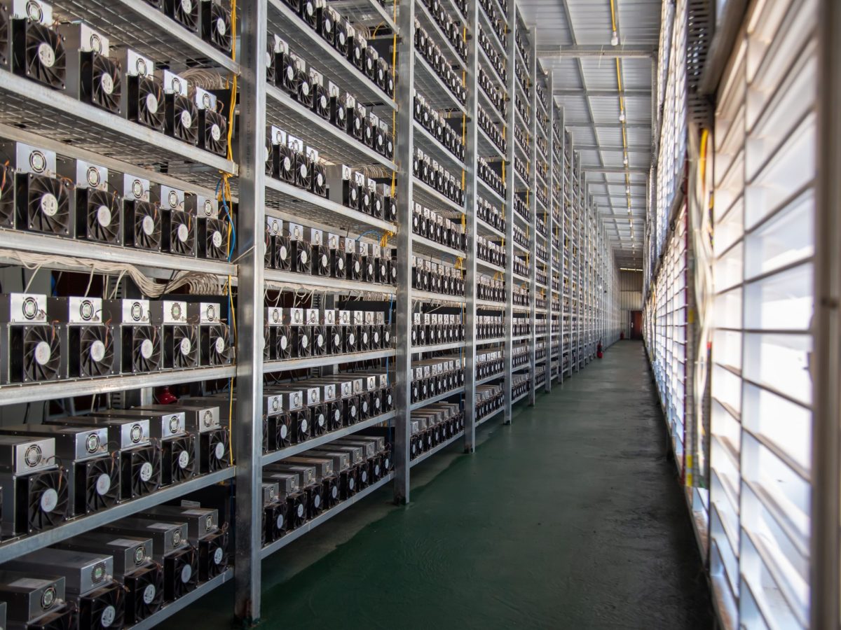 A data processing center shows rows of serves