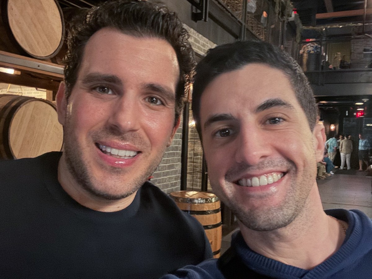 Nicholas Maggipinto left, and Corey Briskin say they were denied full IVF benefits through the city's health insurance.